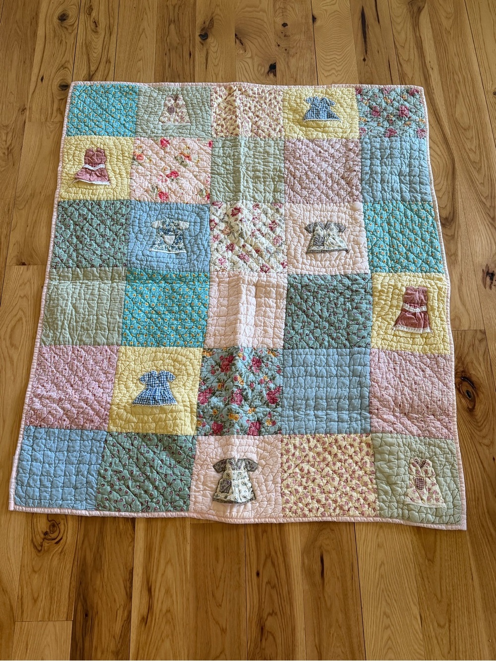 Land Of Nod Patchwork Baby Quilt in Pastel Blue, Pink, Yellow, Cream